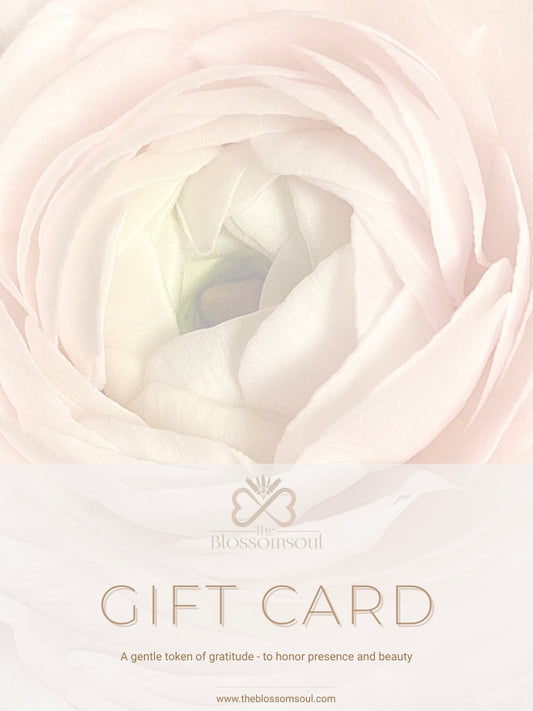 A softly lit floral gift card featuring a pale blush ranunculus, paired with delicate serif text. Designed to express quiet beauty and presence, the Soulful Edition from TheBlossomSoul offers a meaningful digital gifting experience rooted in floral elegance and depth.