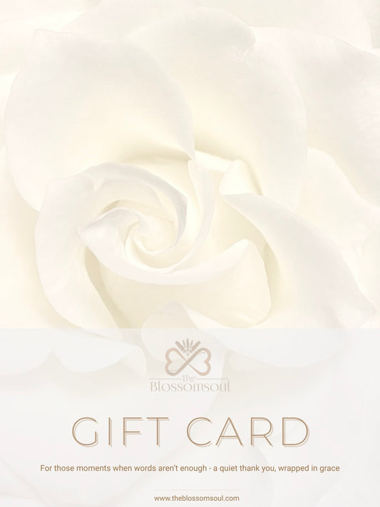 A high-resolution image of a gentle white rose serves as the backdrop for this digital gift card. The Gratitude Edition by TheBlossomSoul is an elegant expression of appreciation, combining floral softness with minimal, intentional design.